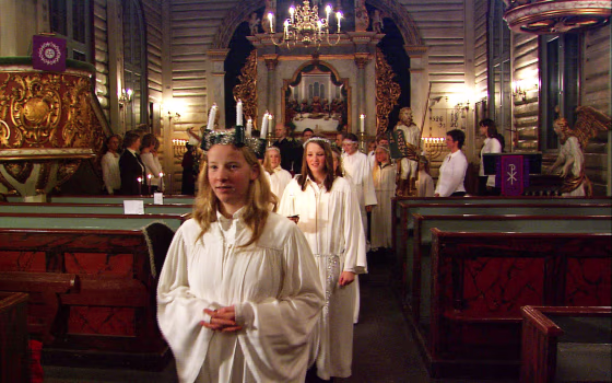 Norwegian girls celebrate the feast of Santa Lucia on Dec. 13 with a candlelight procession. 